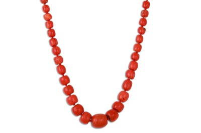 Lot 208 - A CORAL BEADED NECKLACE, to a silver clasp