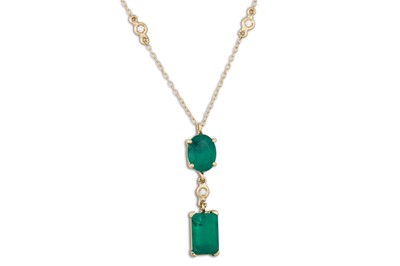 Lot 275 - AN EMERALD AND DIAMOND PENDENT, set with oval...