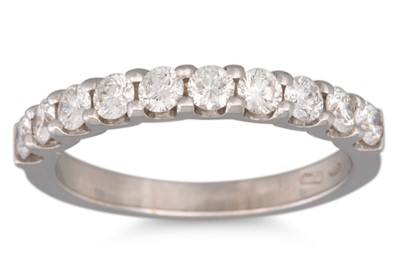 Lot 225 - A DIAMOND HALF ETERNITY RING, the brilliant...