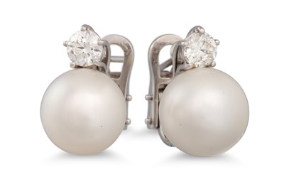 Lot 268 - A PAIR OF DIAMOND AND PEARL STUD EARRINGS, the...