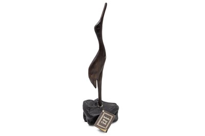 Lot 382 - A BRENDAN COLLUM, Bog oak carving of a heron,...