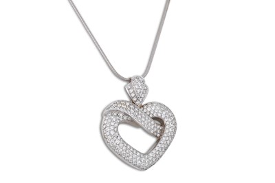 Lot 184 - A DIAMOND HEART SHAPED PENDANT, pavé set in...