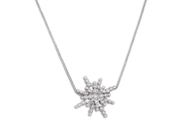 Lot 185 - A DIAMOND PENDANT, modelled as a snowflake,...