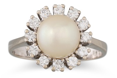 Lot 191 - A DIAMOND AND PEARL CLUSTER RING, mounted in...