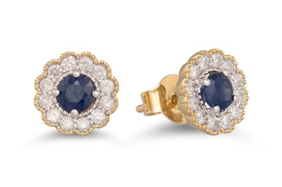 Lot 15 - A PAIR OF DIAMOND AND SAPPHIRE CLUSTER...