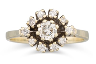Lot 27 - A DIAMOND CLUSTER RING, mounted in white gold....