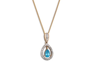 Lot 149 - A DIAMOND AND TOPAZ PENDANT, mounted in gold,...