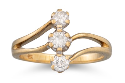 Lot 152 - A DIAMOND THREE STONE RING, mounted in gold,...