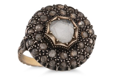 Lot 239 - A VINTAGE DIAMOND CLUSTER RING, mounted in...