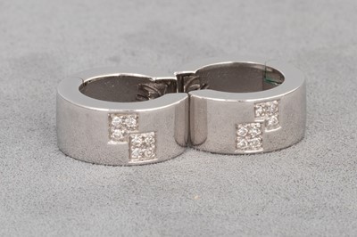 Lot 155 - A PAIR OF DIAMOND HOOP EARRINGS, mounted in...