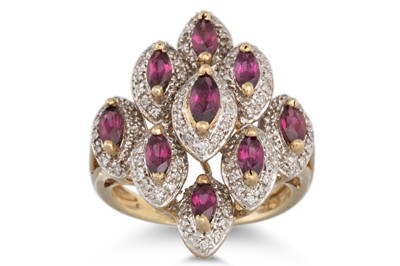 Lot 128 - A GEM SET AND DIAMOND CLUSTER RING, mounted in...