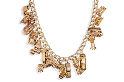 Lot 130 - A HEAVY 9CT GOLD CHARM NECKLACE, each charm...