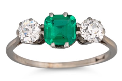 Lot 155 - A COLOMBIAN EMERALD AND DIAMOND THREE STONE...