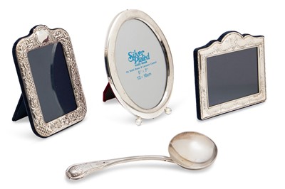 Lot 367 - TWO MODERN SILVER PHOTO FRAMES, an Irish...