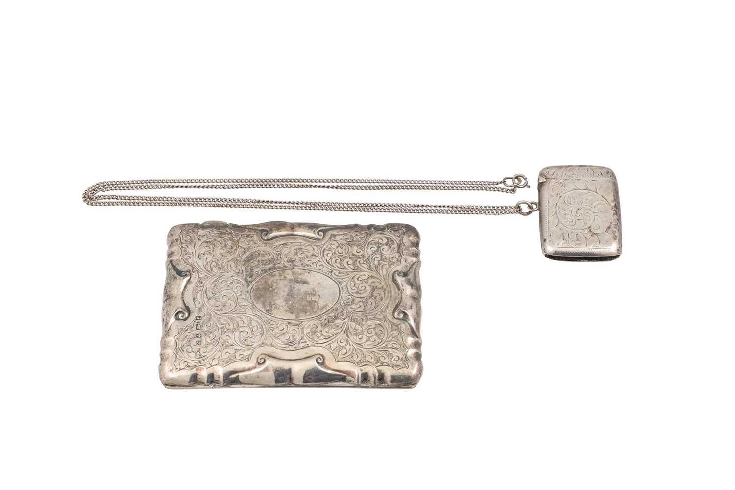Lot 559 - AN EDWARDIAN SILVER LADY'S PURSE, chased &...