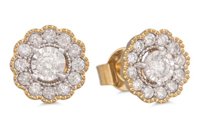 Lot 16 - A PAIR OF DIAMOND CLUSTER EARRINGS, in the...