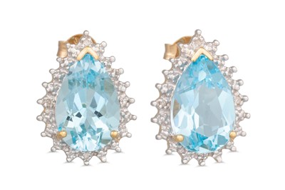 Lot 85 - A PAIR OF BLUE TOPAZ AND DIAMOND EARRINGS, the...