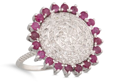 Lot 299 - A RUBY AND DIAMOND CLUSTER RING, circular form...