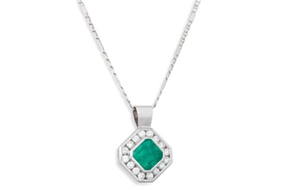 Lot 256 - AN EMERALD AND DIAMOND PENDANT, the...