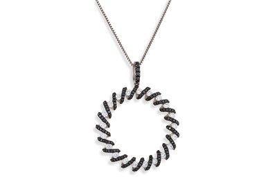 Lot 206 - A MODERN BLACK AND WHITE DIAMOND PENDANT,...