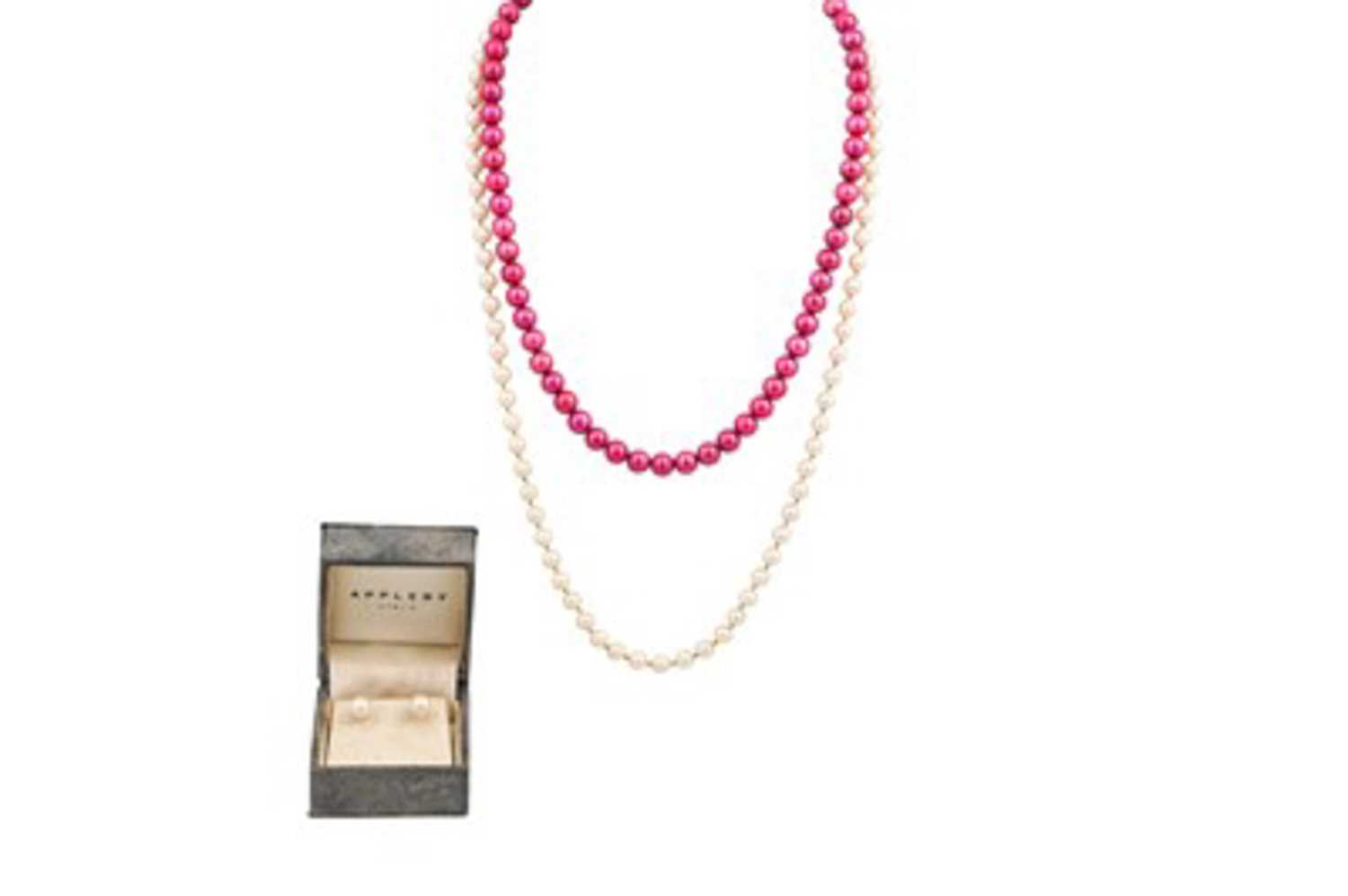 Lot 488 - A CULTURED PEARL NECK LACE, with gold clasp,...