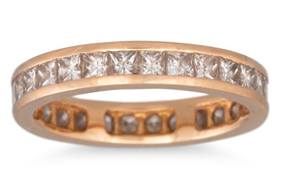 Lot 288 - A DIAMOND ETERNITY RING, the princess cut...