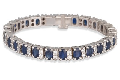 Lot 171 - A SAPPHIRE AND DIAMOND LINE BRACELET, the...