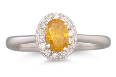 Lot 263 - A DIAMOND CLUSTER RING, the oval fancy yellow...