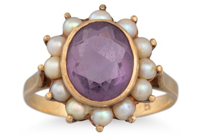 Lot 11 - AN AMETHYST AND SEED PEARL RING, mounted in...