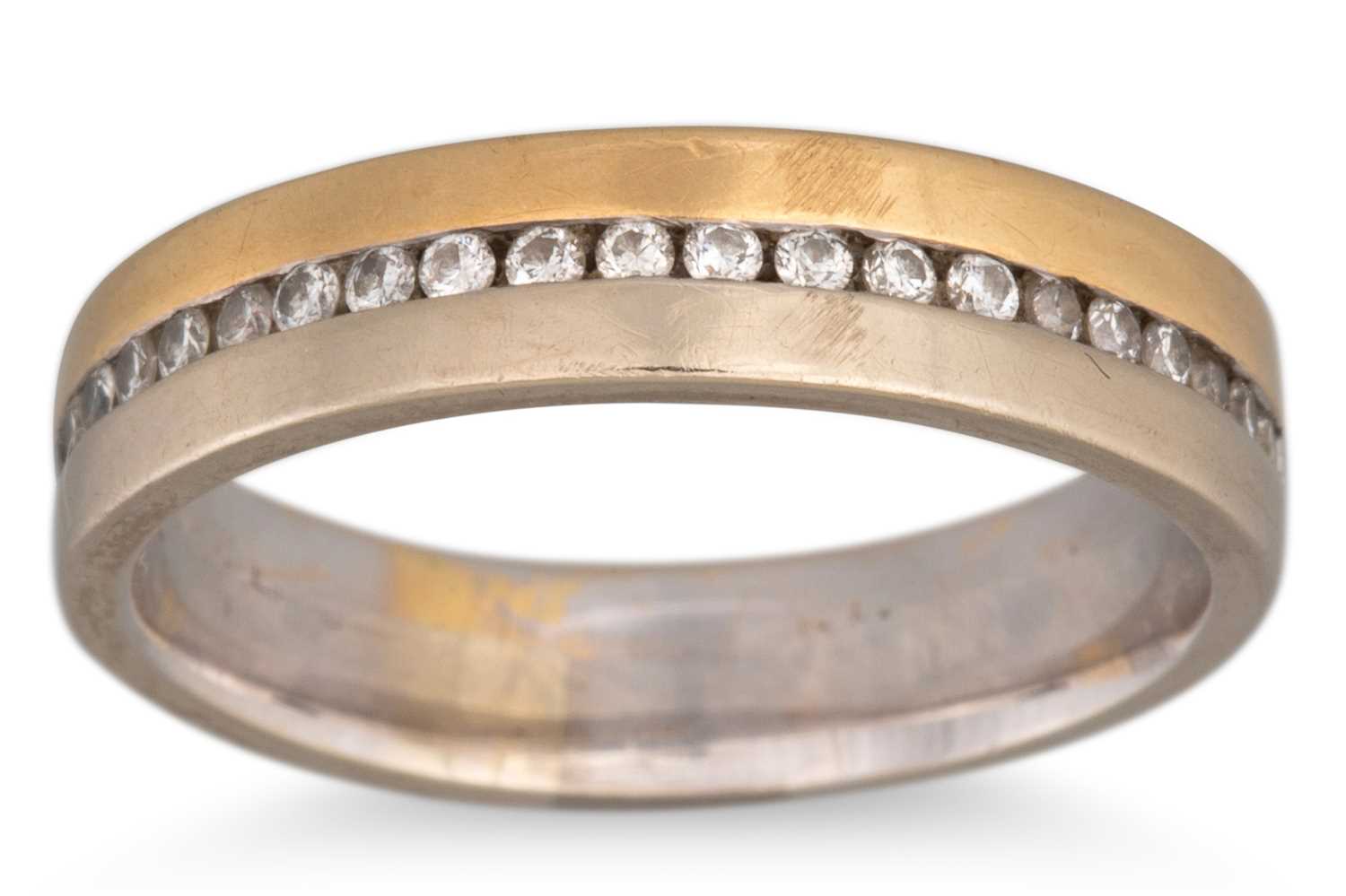 Lot 31 - A DIAMOND HALF ETERNITY RING, mounted in...
