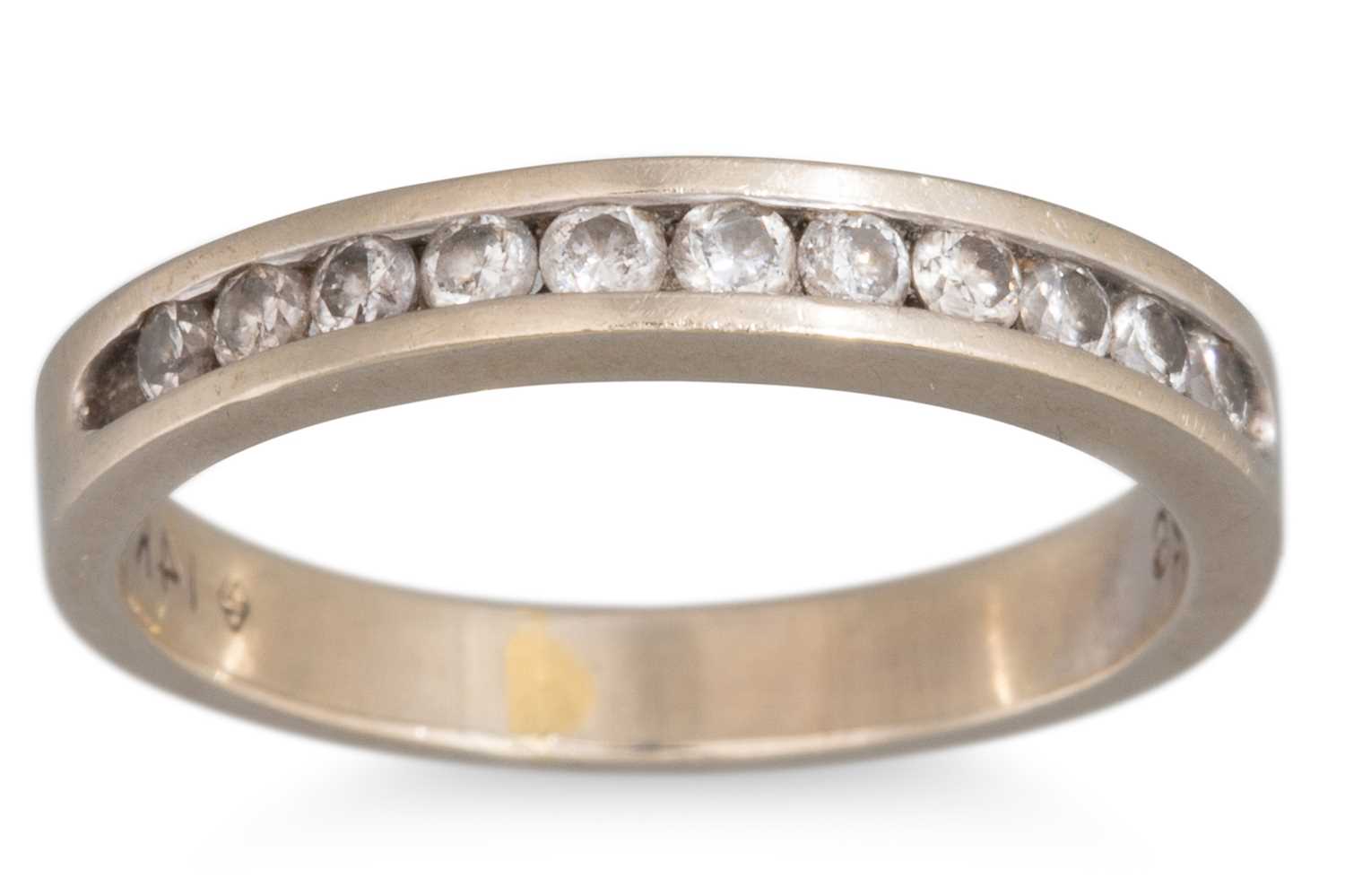 Lot 32 - A DIAMOND HALF ETERNITY RING, mounted in 14ct...