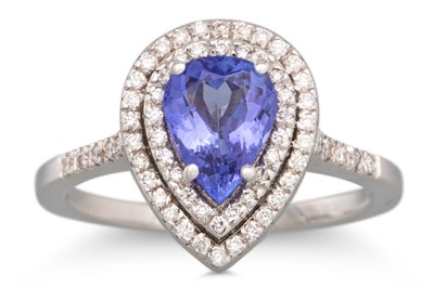 Lot 267 - A TANZANITE AND DIAMOND CLUSTER RING, the pear...