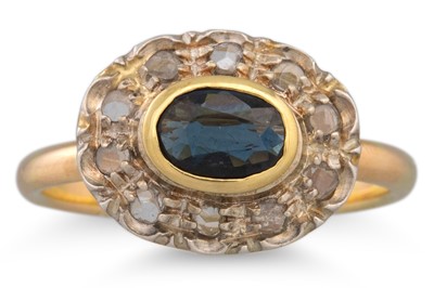 Lot 270 - A VINTAGE SAPPHIRE AND DIAMOND CLUSTER RING,...