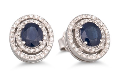 Lot 317 - A PAIR OF SAPPHIRE AND DIAMOND EARRINGS, of...