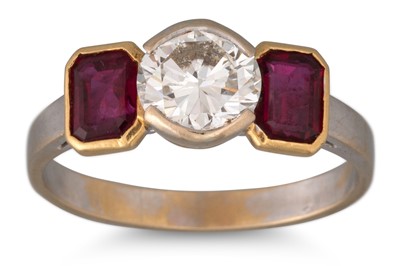 Lot 306 - A VINTAGE DIAMOND AND RUBY THREE STONE RING,...