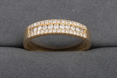 Lot 75 - A THREE ROWED DIAMOND RING, in 18ct gold, size L