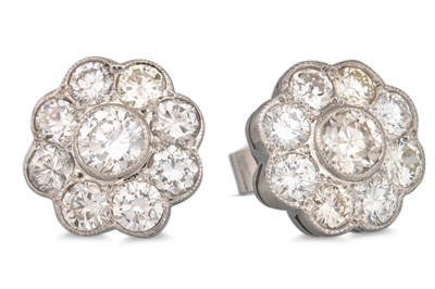 Lot 356 - A PAIR OF DIAMOND 'DAISY' CLUSTER EARRINGS,...