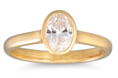 Lot 122 - AN OVAL DIAMOND SOLITAIRE RING, bezel set in...