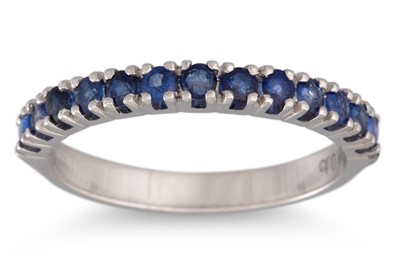 Lot 131 - A SAPPHIRE HALF ETERNITY RING, mounted in 18ct...