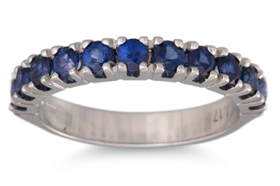 Lot 132 - A SAPPHIRE HALF ETERNITY RING, mounted in 18ct...