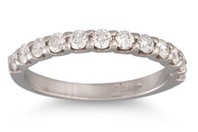 Lot 168 - A DIAMOND HALF ETERNITY RING, the brilliant...