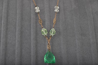 Lot 80 - A VINTAGE GLASS PENDANT, on a gold chain