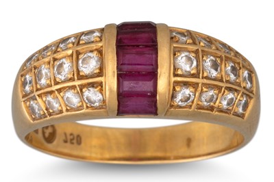 Lot 44 - A RUBY AND DIAMOND BOMBÉ RING, the channel set...