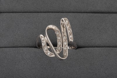 Lot 146 - A DIAMOND SET RING, of abstract twist design,...