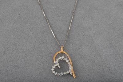 Lot 151 - A DIAMOND SET HEART PENDANT, set in 18ct white...