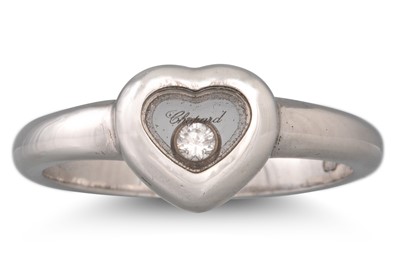 Lot 42 - A CHOPARD HAPPY DIAMOND RING, the heart shaped...