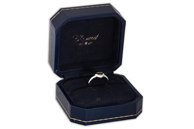 Lot 42 - A CHOPARD HAPPY DIAMOND RING, the heart shaped...