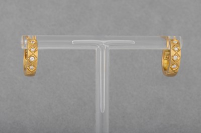 Lot 132 - A PAIR OF DIAMOND HOOP EARRINGS, mounted in...