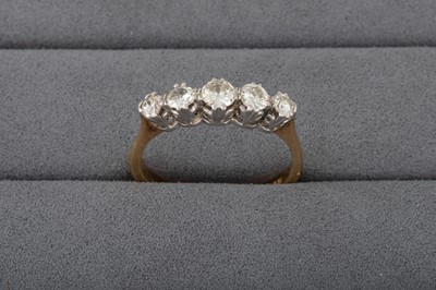 Lot 134 - A FIVE STONE DIAMOND RING, the old cut...