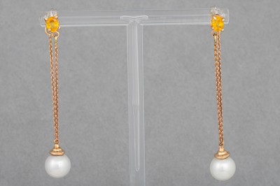 Lot 47 - A PAIR OF YELLOW SAPPHIRE AND AKOYA PEARL DROP...